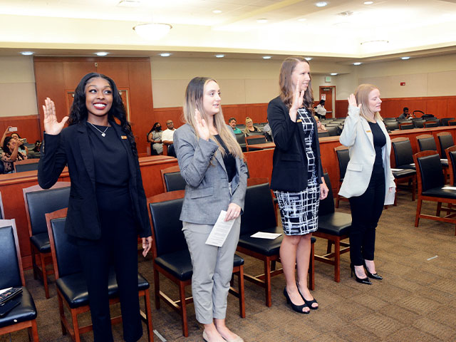 Three law students swearing in